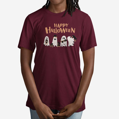 A woman wearing a maroon Bella Canvas t-shirt featuring four ghosts holding Beauceron puppies.