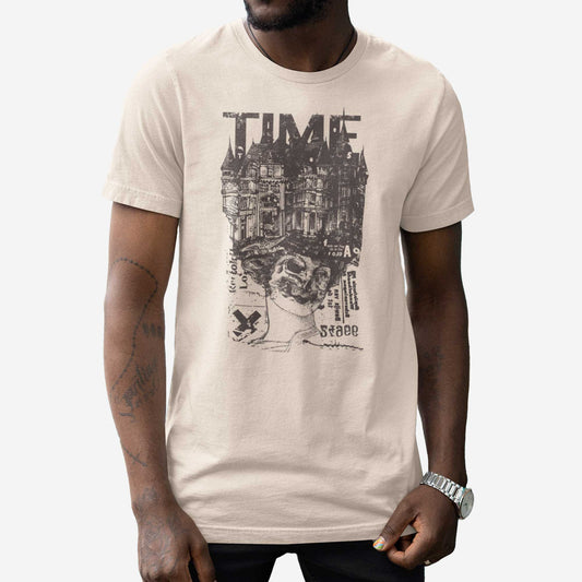 A man wearing a soft cream Bella Canvas t-shirt featuring a collage of a face of a Victorian era woman with a skull, text, a crumbling castle and the words time.