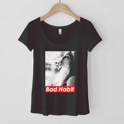 A hanging black District 7501 t-shirt featuring a grainy photograph of a woman smoking with the words bad habit below.