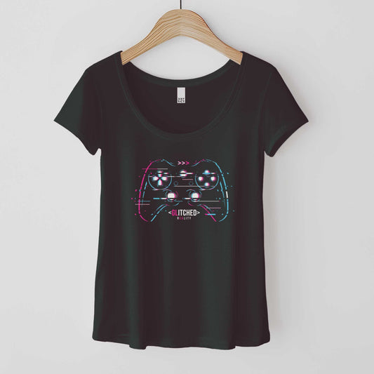 A hanging black District 7501 scoop neck t-shirt featuring a glitchy video game controller in neon colors with the words glitched reality.