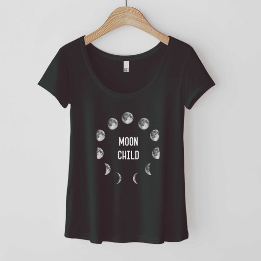 A black District 7501 scoop neck t-shirt with the phases of the moon in a circle and the words moon child in the center.