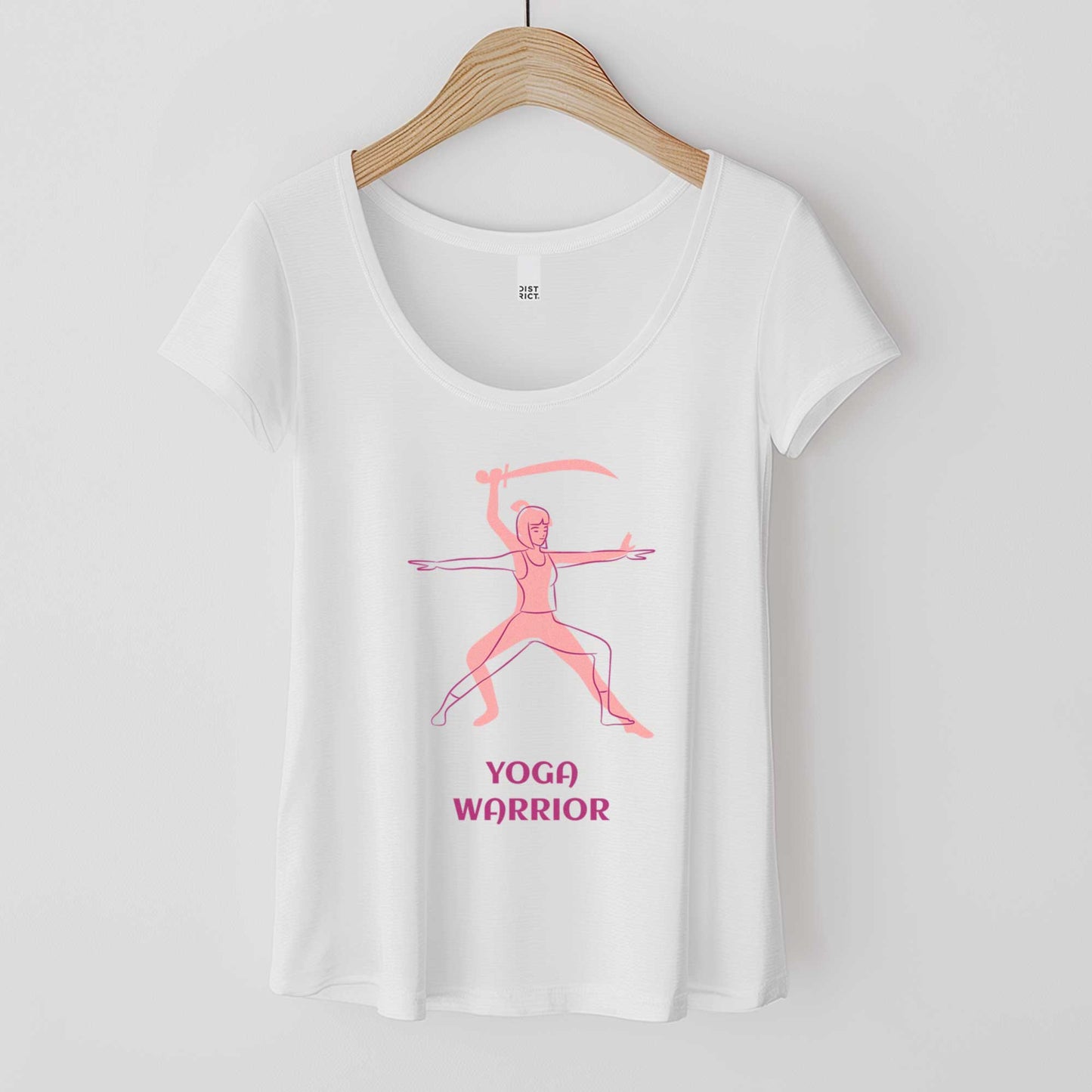 A hanging white District scoop neck tee featuring a silhouette of a woman in the warrior pose with the words yoga warrior below it.